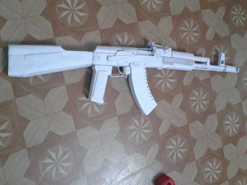 Как сделать из бумаги пистолет, который стреляет резинками: легкая схема своими руками